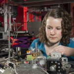 Experimental set up in RAL Space's Laser Spectroscopy Laboratory at STFC's Rutherford Appleton Laboratory on 5th February 2016. Image shows Dr Helen Butcher adjusting a spectrometer used to measure CO2 content in water.